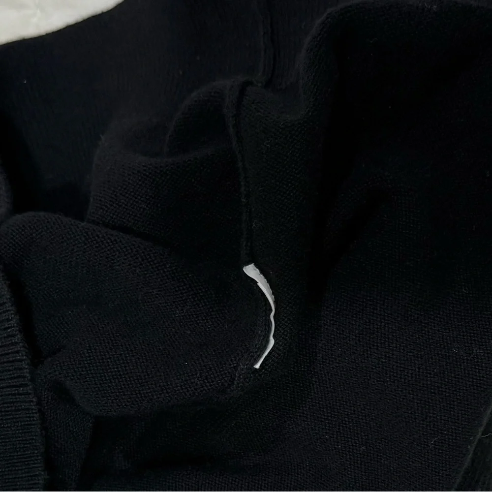 Michael Kors Men's Classic Black V-Neck Sweater material tag cut out